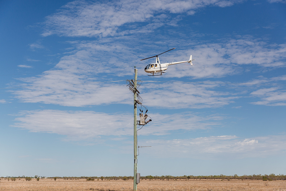 Queensland Helicopters - power pole